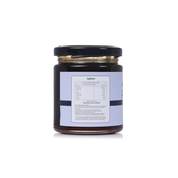 Jar of honey with a label on a white background