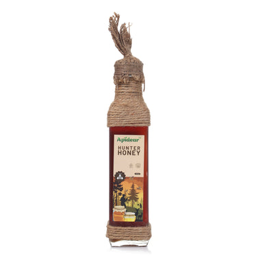 Bottle of Apidear Hunter Honey with a rustic design on a white background