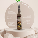 A bottle of Hunter Honey with labels indicating health benefits such as supporting heart health, helping with sleep and relaxation, improving skin and wound healing, and being a natural remedy for cough and sore throat.